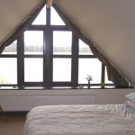 Безскатные чердачные окна