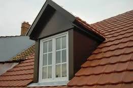 Мансардное слуховое окно