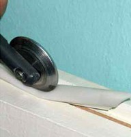 Инструмент для закатки утеплителя в паз